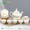 Ấm chén đài các vẽ làng quê vàng kim