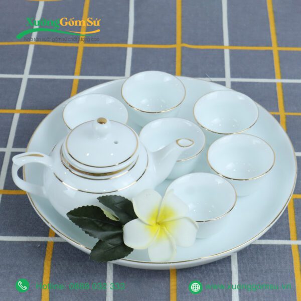 Bộ ấm chén dáng quả hồng kẻ chỉ