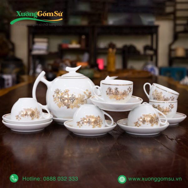 Bộ ấm chén trăng khuyết vẽ hoa vàng kim